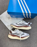 Ad Adizero Boston 12 Cinza/Chocolate