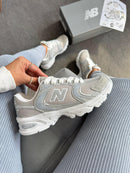 NB 530 Cinza/Bco