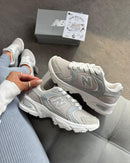 NB 530 Cinza/Bco